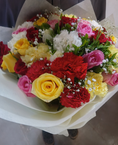 30 mixed roses with paper packing