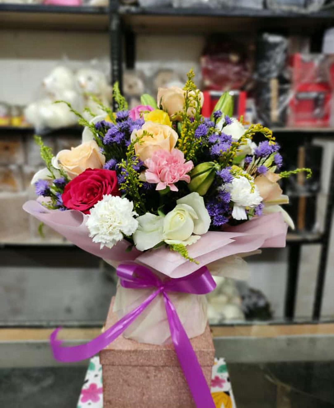 Mixed Flowers Arangement With Paper Packing