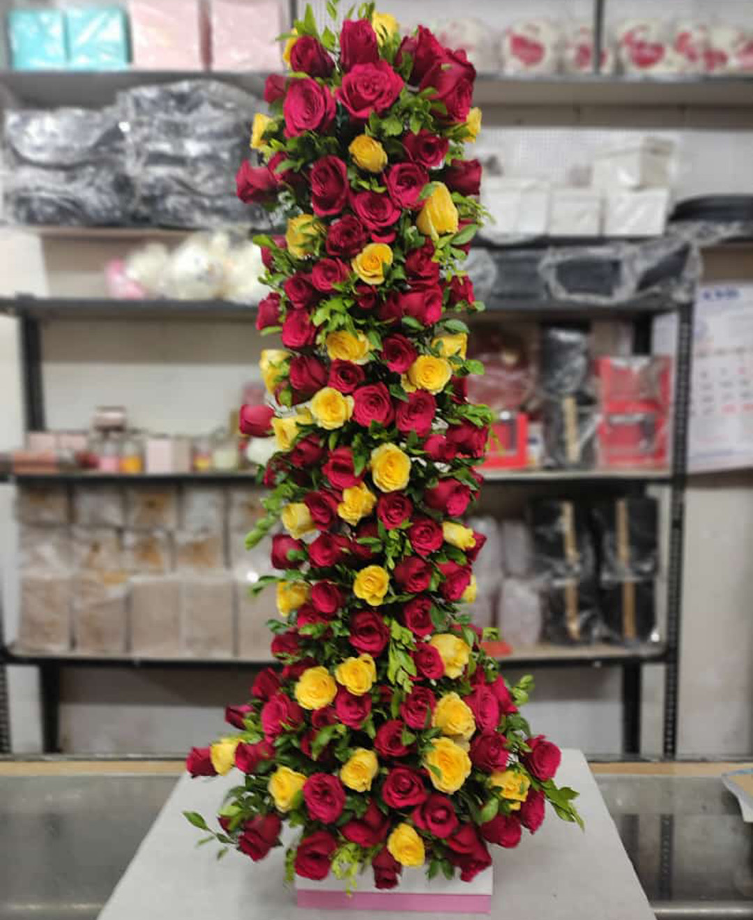 100 Red And Yellow Roses Tall Arrangement