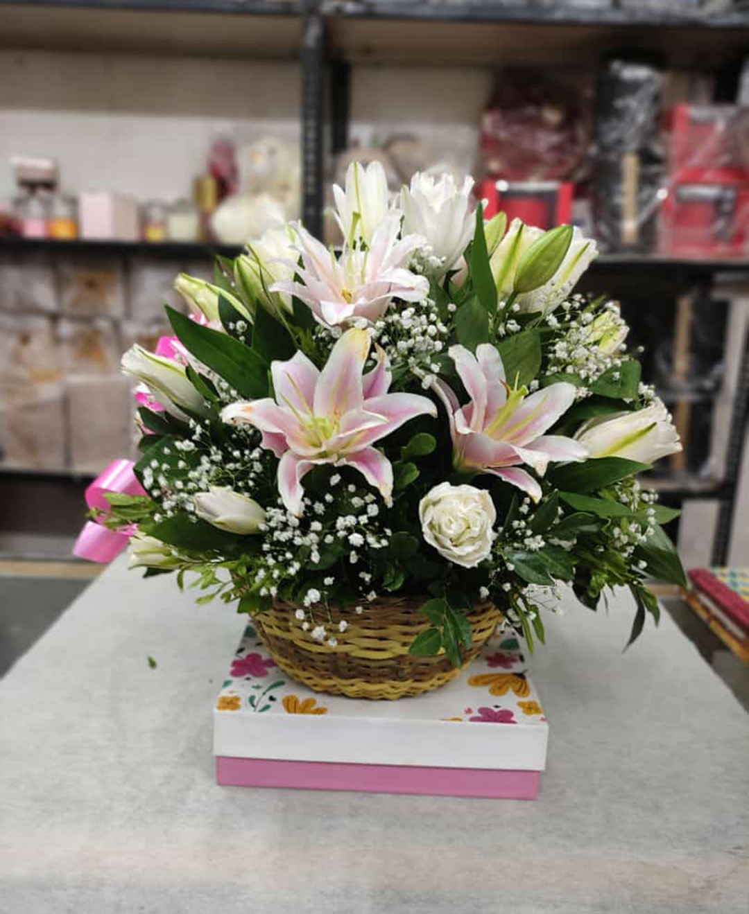 10 Pink And White Lilies Basket