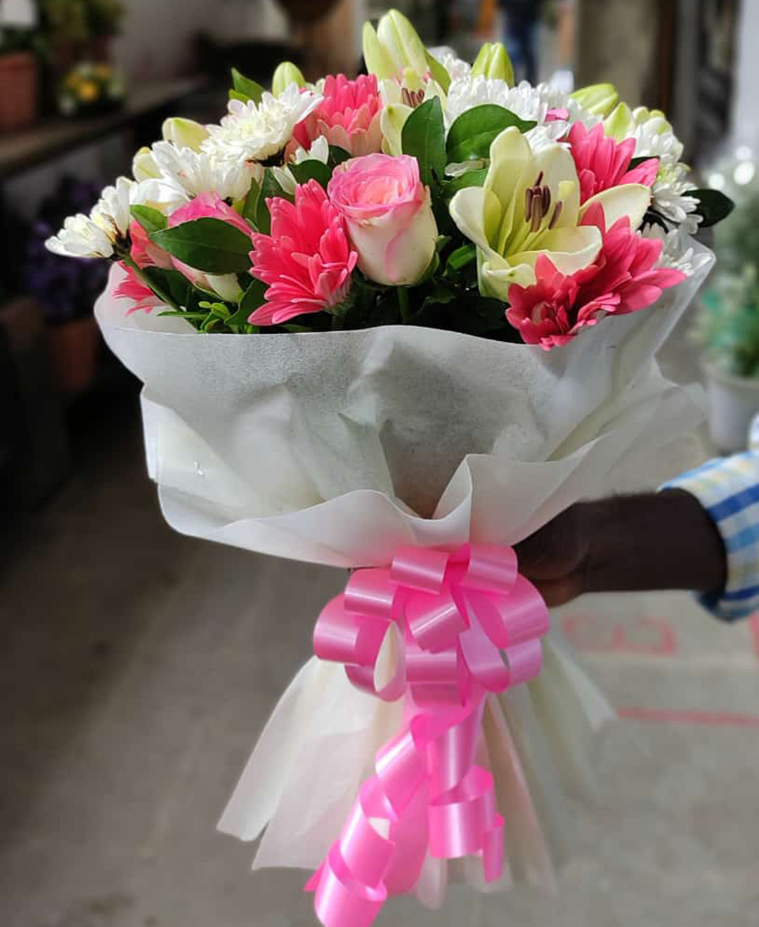 5 White Lilies, 10 Pink Roses and 10 Pink Gerbera Bunch With Paper Packing