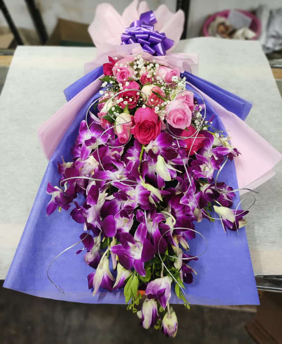 6 Orchids And 10 Roses Bouquet With Paper Packing